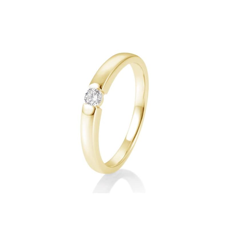 Ein puristischer Ring mit schlichtem Design und zentralem Diamanten. 